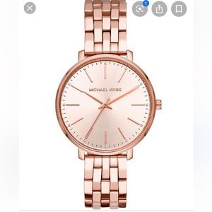 Michael Kors rose gold watch.